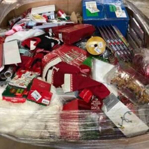 Christmas pallet with baubles, string lights, and holiday decorations
